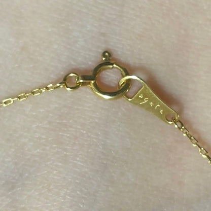 Agete K18 yellow gold necklace with millegrain diamond accents and single Akoya pearl on adjustable 40 cm chain