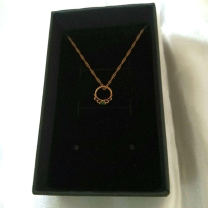 Agete gold necklace with ring design and green stone made of 10 karat K10 gold