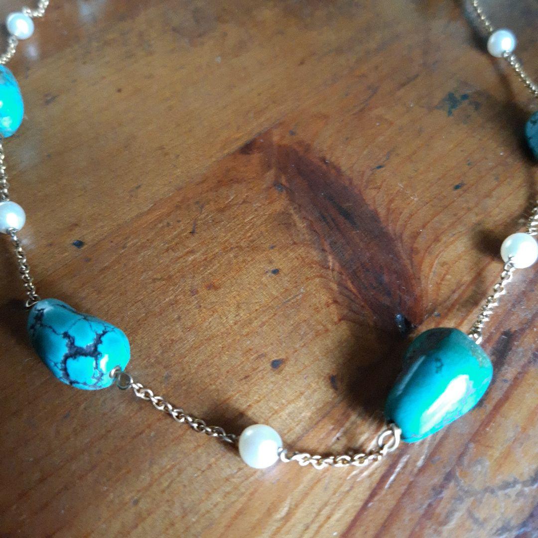 ajete Select Antique Necklace with 44cm gold chain, turquoise decoration, and pearl accents