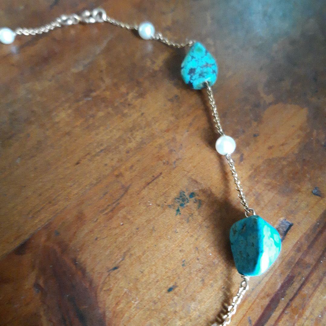 ajete Select Antique Necklace with 44cm gold chain, turquoise decoration, and pearl accents