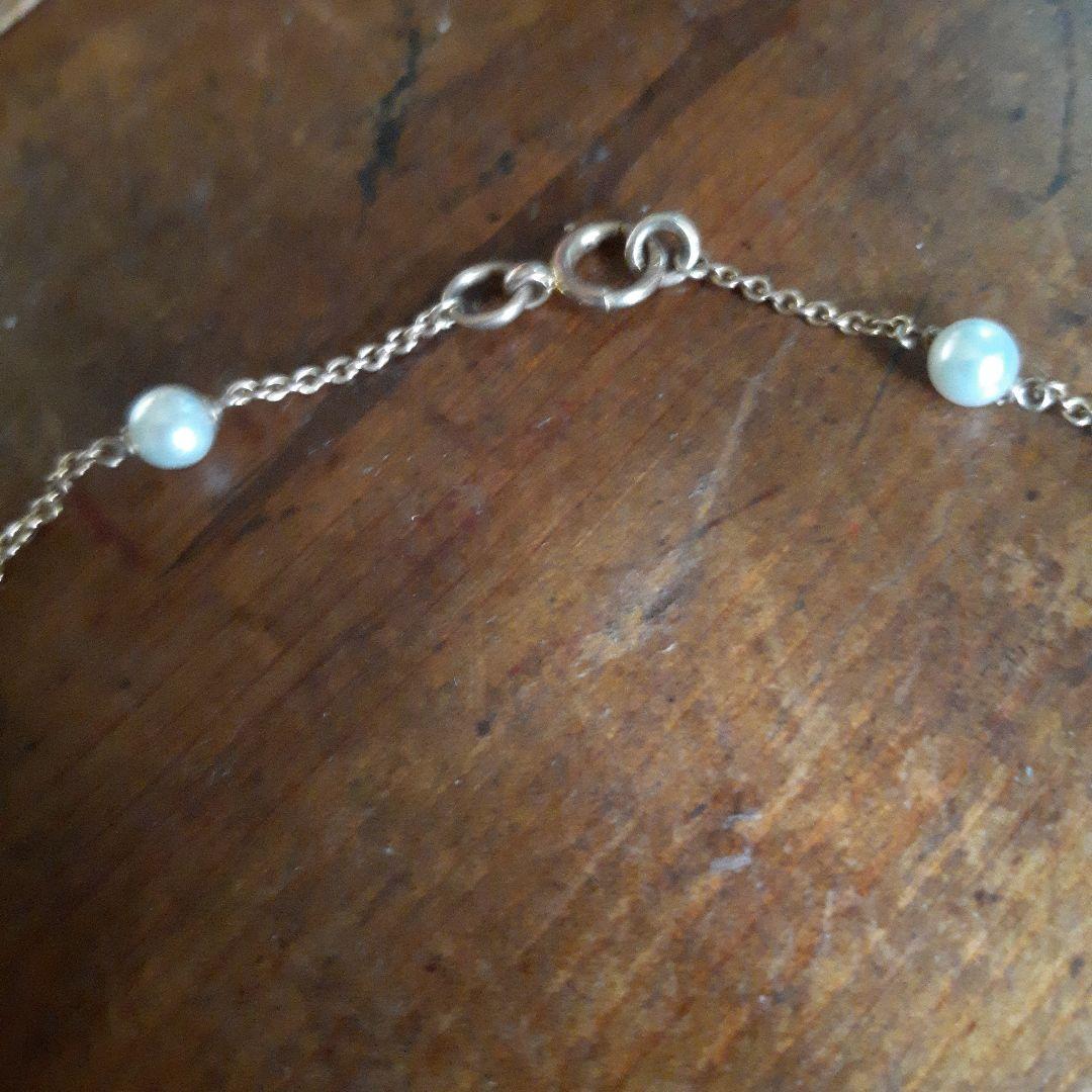 ajete Select Antique Necklace with 44cm gold chain, turquoise decoration, and pearl accents
