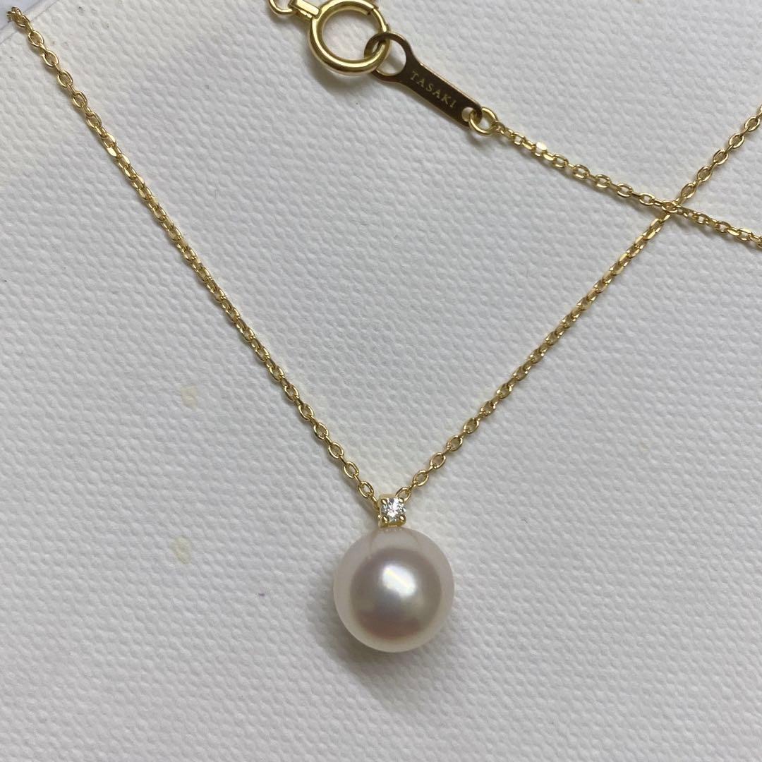 Tasaki K18 gold necklace featuring an 8mm Akoya pearl and a small diamond on a koza chain