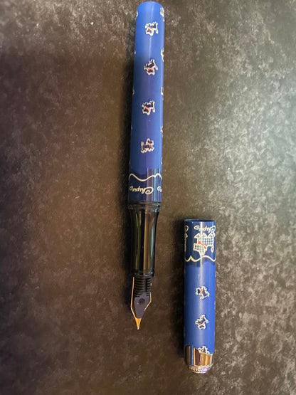 Blue fountain pen set with dog illustration design by Pilot, includes 4 pens in total