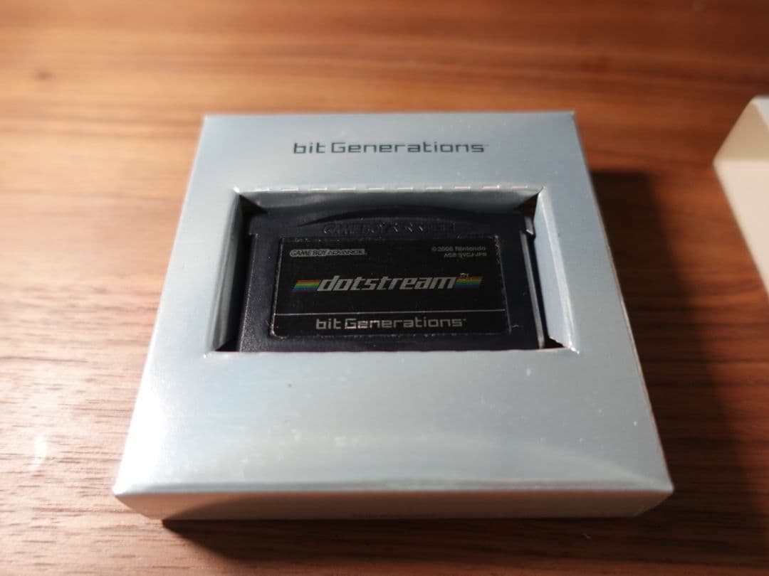 GBAbit Generations Dotstream game cartridge showing front label and contacts in clean condition