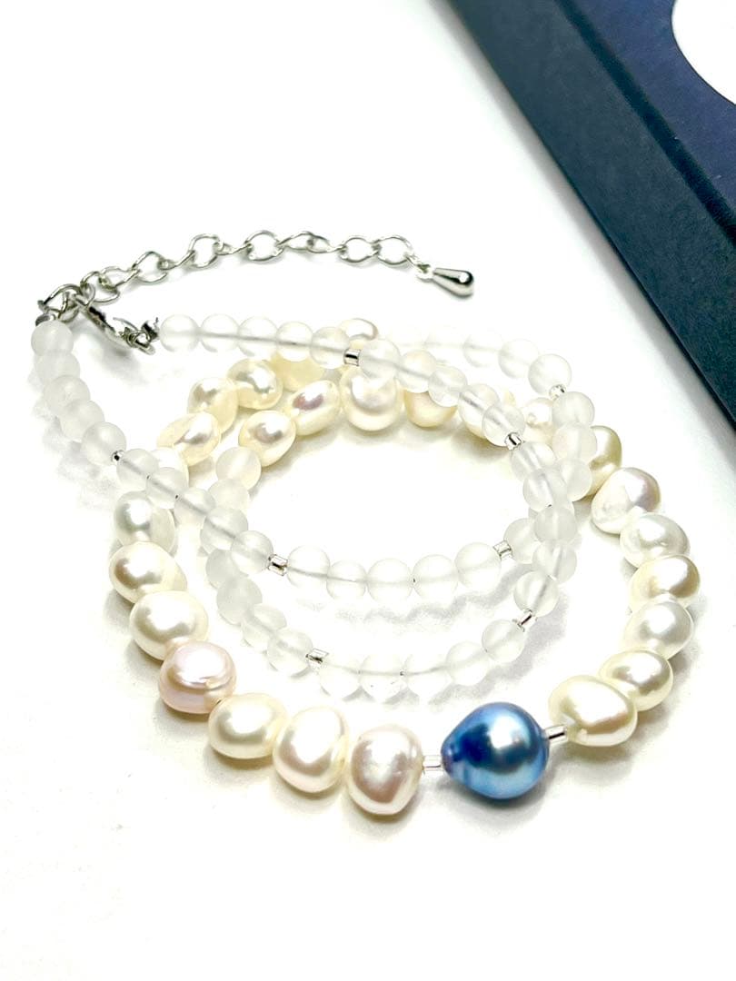 Owari Akoya pearl necklace featuring black and indigo blue pearls with baroque pearls and frozen quartz accents