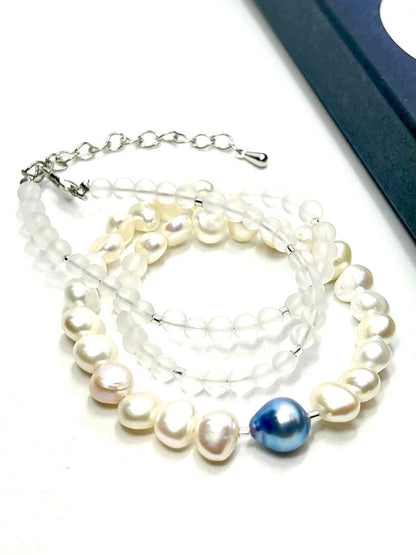 Owari Akoya pearl necklace featuring black and indigo blue pearls with baroque pearls and frozen quartz accents