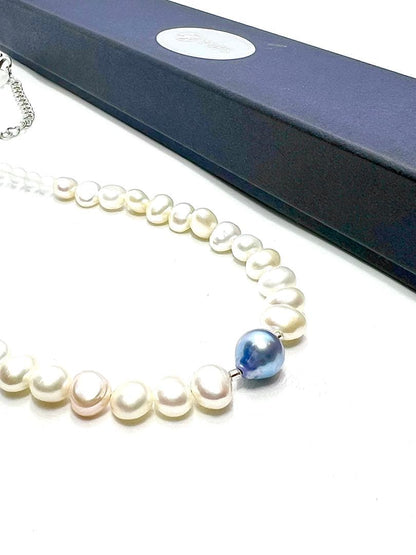 Owari Akoya pearl necklace featuring black and indigo blue pearls with baroque pearls and frozen quartz accents
