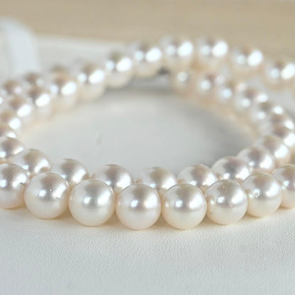 Takashi Akoya pearl necklace with 8-7.5mm pearls and ribbon clasp, 42cm length