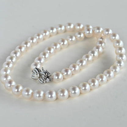 Takashi Akoya pearl necklace with 8-7.5mm pearls and ribbon clasp, 42cm length