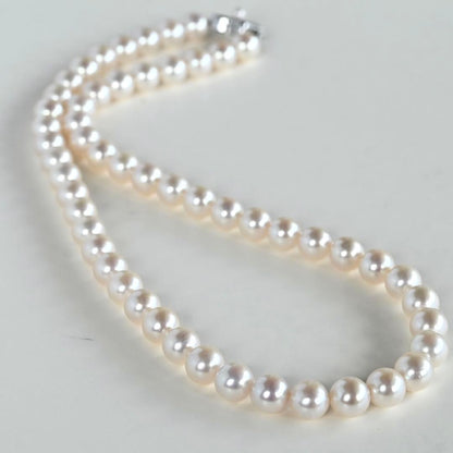 Takashi Akoya pearl necklace with 8-7.5mm pearls and ribbon clasp, 42cm length