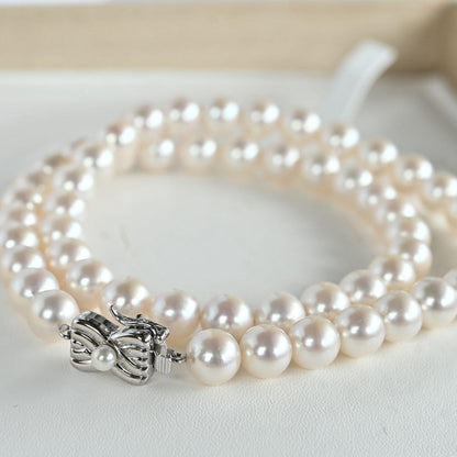 Takashi Akoya pearl necklace with 8-7.5mm pearls and ribbon clasp, 42cm length