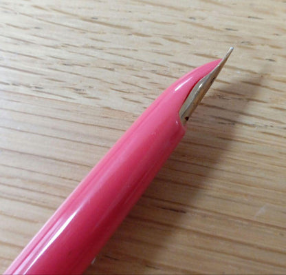 Pilot fountain pen with short fine 14K gold nib and gold beige and cherry red body