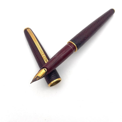 Pilot K18 fountain pen in Bordeaux color with gold trim and engraved clip shown against white background
