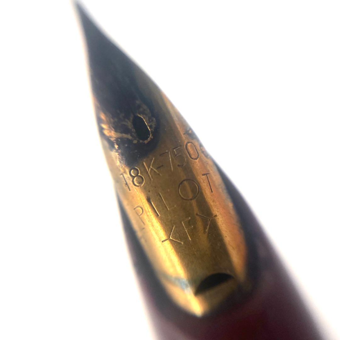 Pilot K18 fountain pen in Bordeaux color with gold trim and engraved clip shown against white background