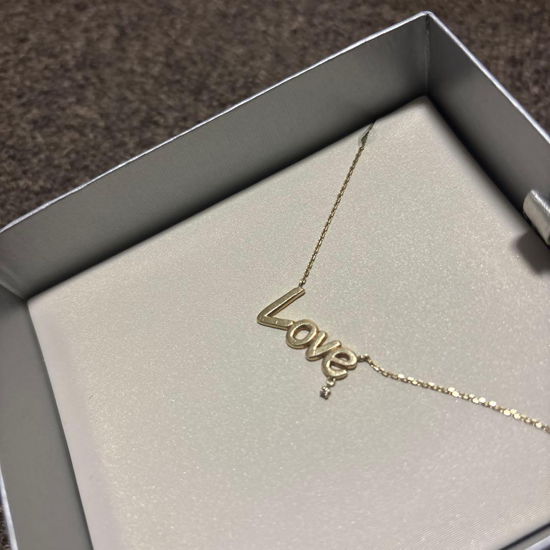 Agat K10 LOVE Necklace with a pointed 0.01 carat diamond and adjustable two-stage chain