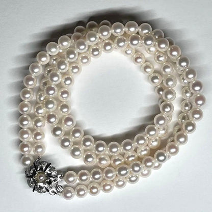 Akoya pearl 2-strand necklace with 5.8-6.5mm pearls and silver clasp on white background