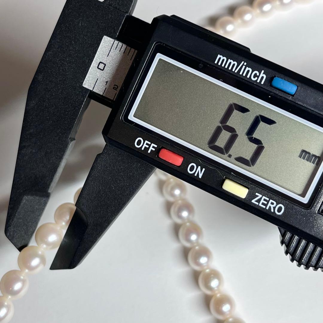 Akoya pearl 2-strand necklace with 5.8-6.5mm pearls and silver clasp on white background
