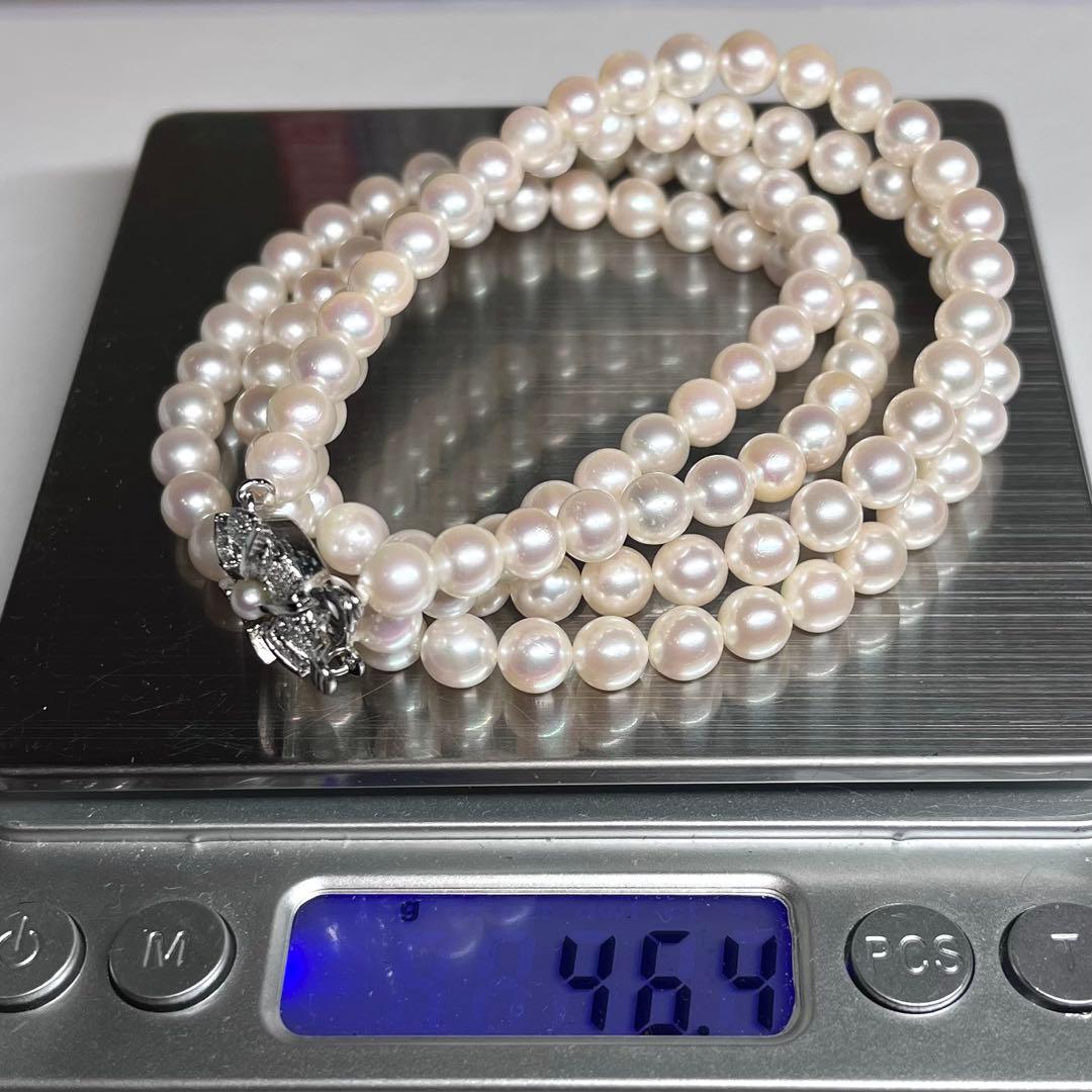 Akoya pearl 2-strand necklace with 5.8-6.5mm pearls and silver clasp on white background