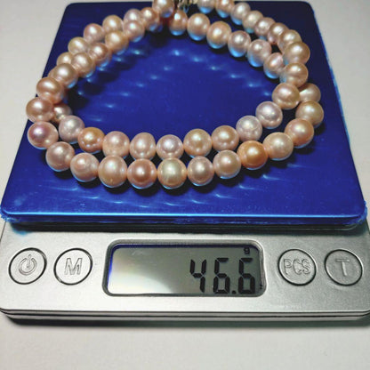 Akoya pink genuine pearl baroque necklace with silver stamp featuring 7.7mm-9.9mm pearls