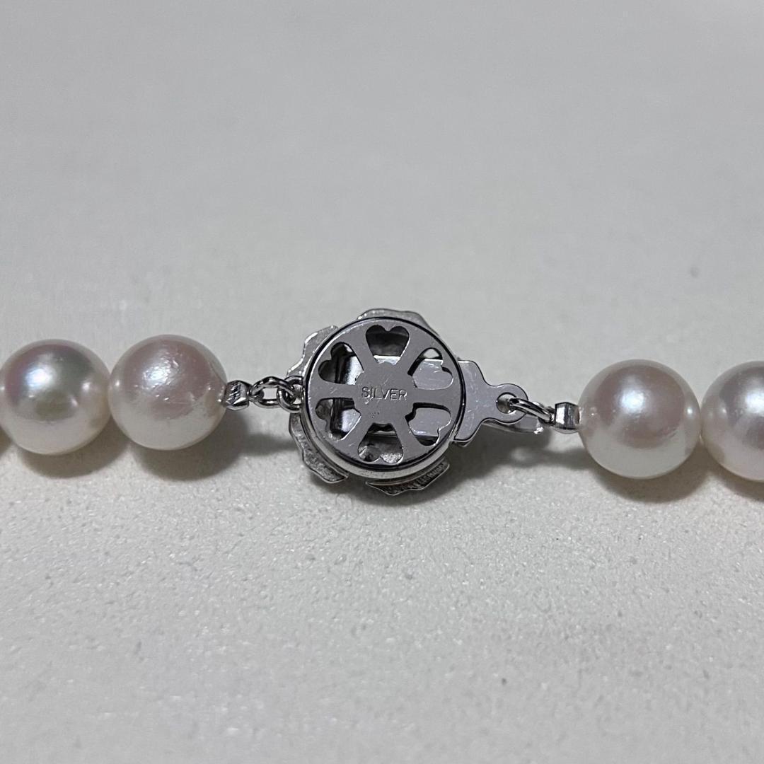 Akoya pearl necklace with 8.5-9mm pearls and silver stamped metal fittings measuring 43.5 cm