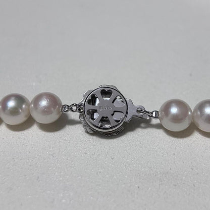 Akoya pearl necklace with 8.5-9mm pearls and silver stamped metal fittings measuring 43.5 cm