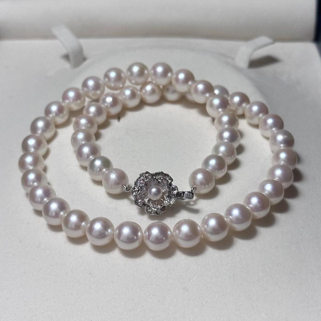 Akoya pearl necklace with 8.5-9mm pearls and silver stamped metal fittings measuring 43.5 cm