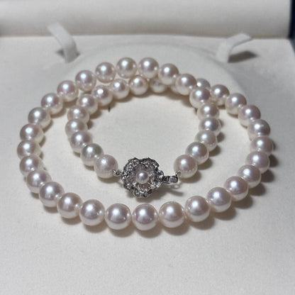 Akoya pearl necklace with 8.5-9mm pearls and silver stamped metal fittings measuring 43.5 cm