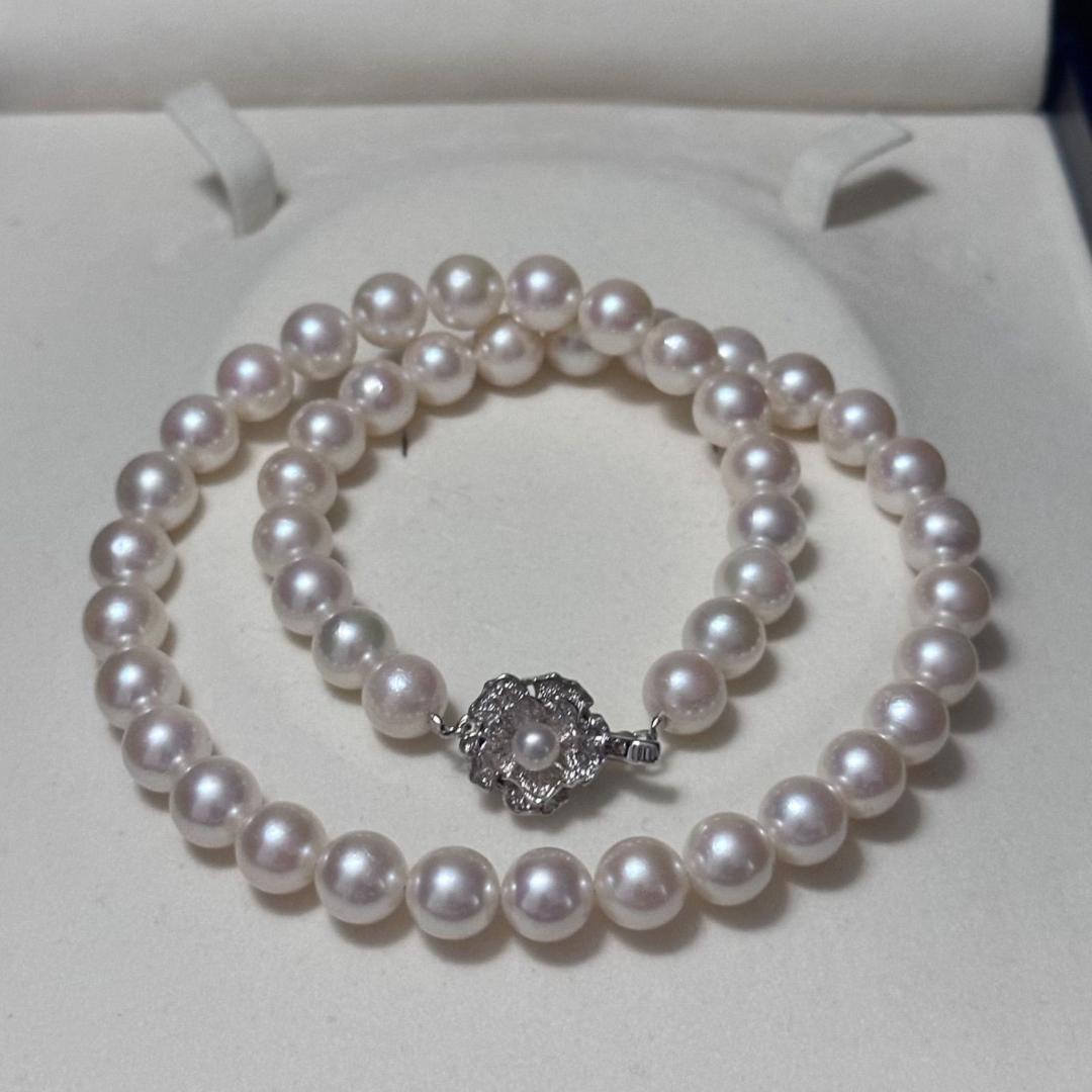 Akoya pearl necklace with 8.5-9mm pearls and silver stamped metal fittings measuring 43.5 cm