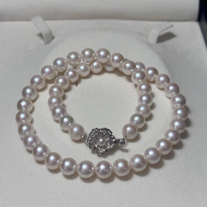 Akoya pearl necklace with 8.5-9mm pearls and silver stamped metal fittings measuring 43.5 cm