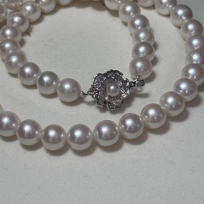 Akoya pearl necklace with 8.5-9mm pearls and silver stamped metal fittings measuring 43.5 cm