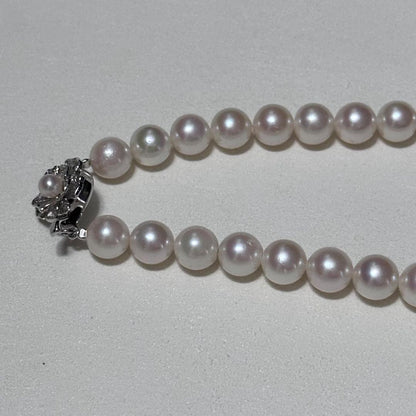 Akoya pearl necklace with 8.5-9mm pearls and silver stamped metal fittings measuring 43.5 cm