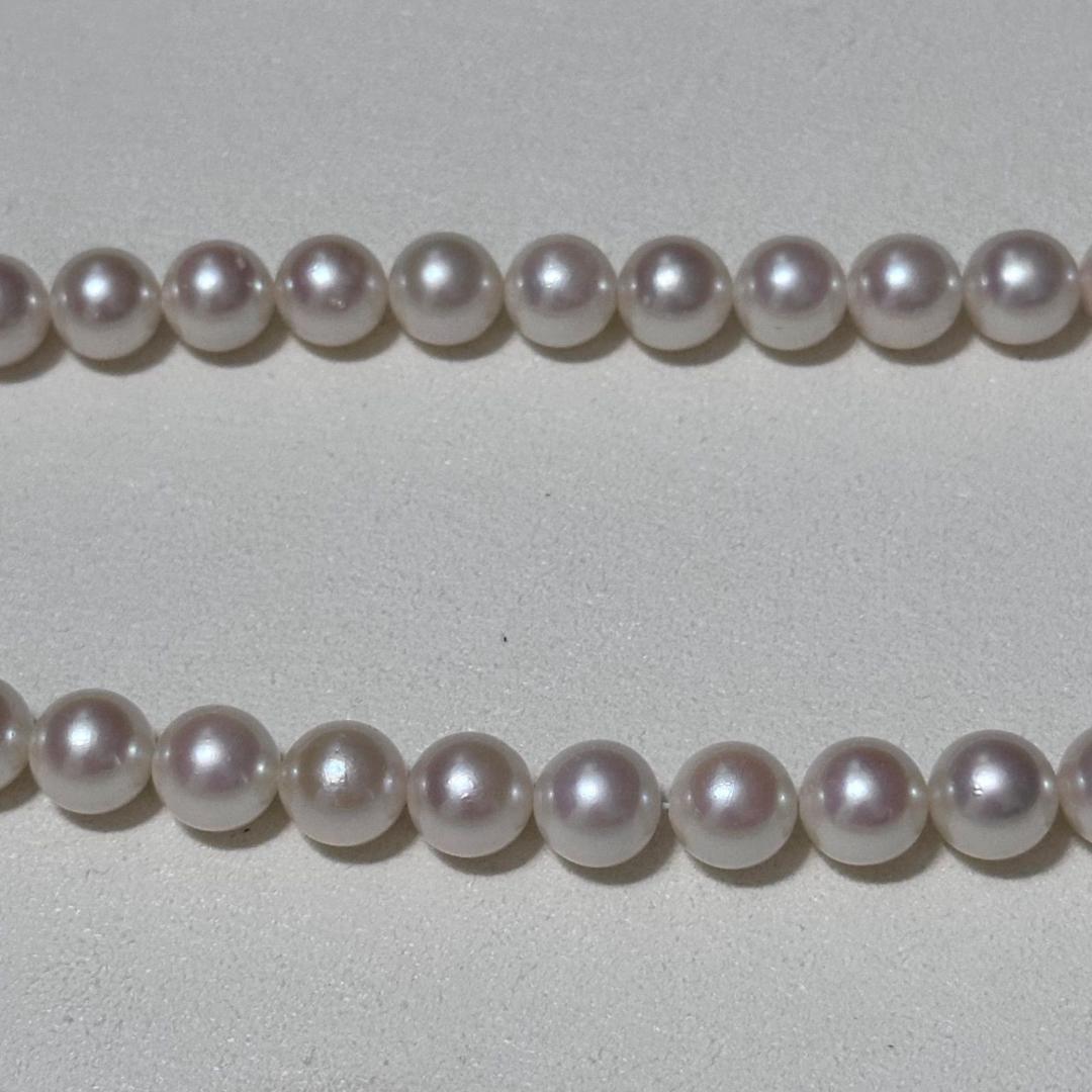 Akoya pearl necklace with 8.5-9mm pearls and silver stamped metal fittings measuring 43.5 cm