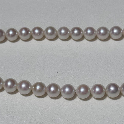 Akoya pearl necklace with 8.5-9mm pearls and silver stamped metal fittings measuring 43.5 cm
