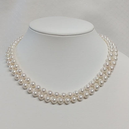 Akoya pearl long necklace with two strands of round 6.5-7 mm pearls measuring 85 cm