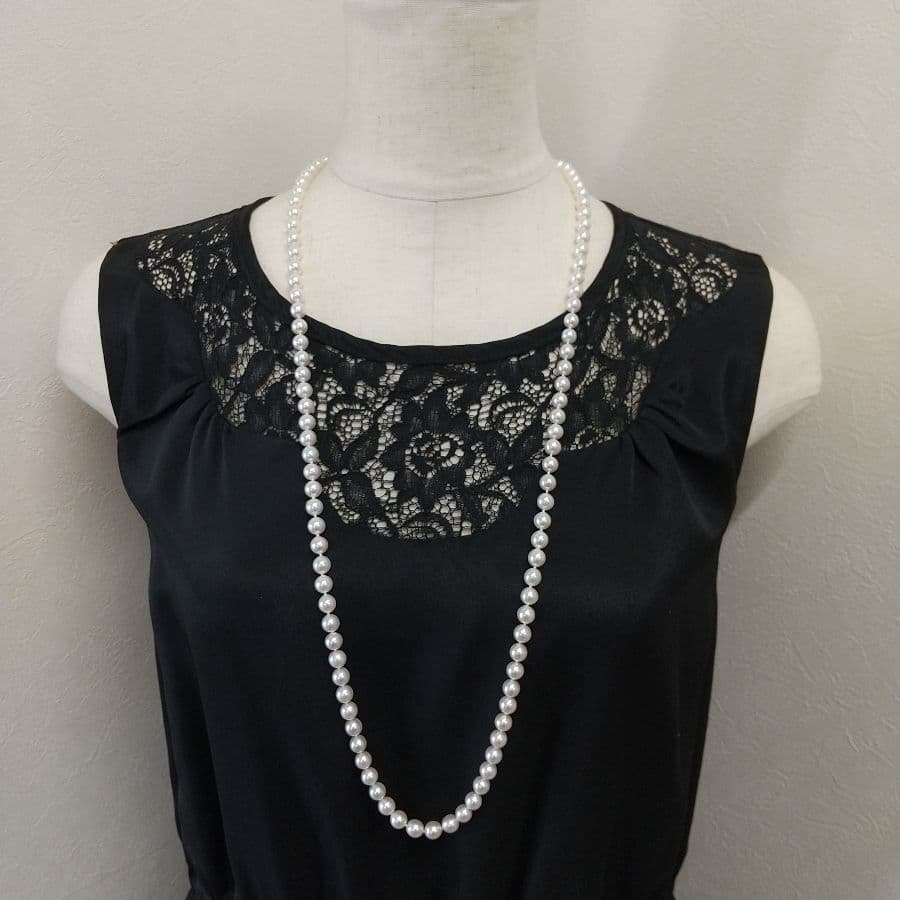 Akoya pearl long necklace with two strands of round 6.5-7 mm pearls measuring 85 cm