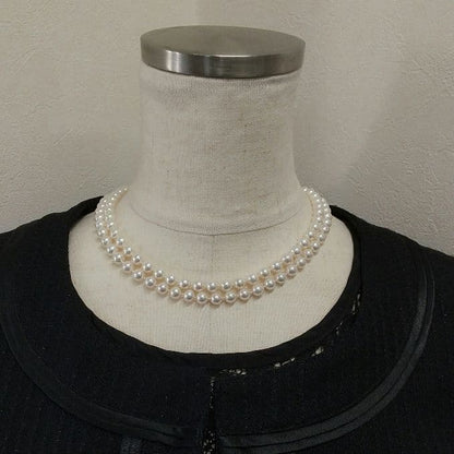 Akoya pearl long necklace with two strands of round 6.5-7 mm pearls measuring 85 cm