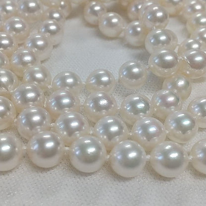 Akoya pearl long necklace with two strands of round 6.5-7 mm pearls measuring 85 cm