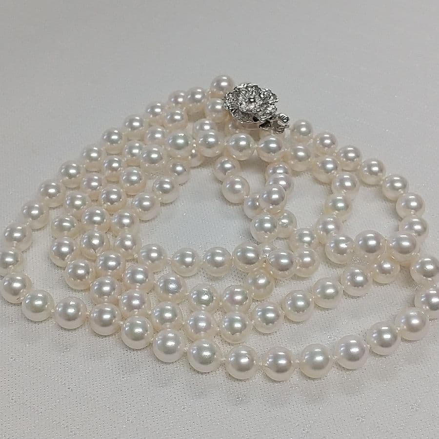 Akoya pearl long necklace with two strands of round 6.5-7 mm pearls measuring 85 cm