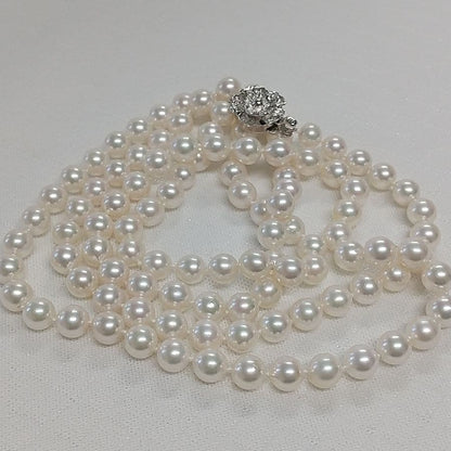 Akoya pearl long necklace with two strands of round 6.5-7 mm pearls measuring 85 cm