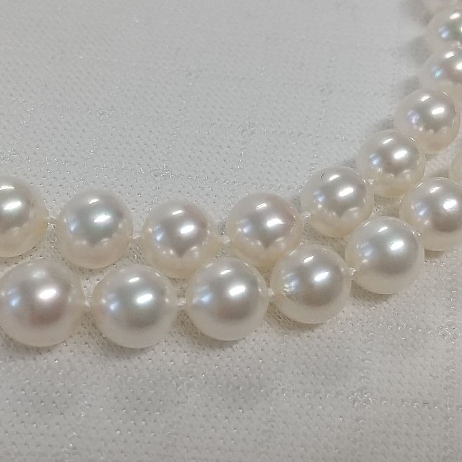Akoya pearl long necklace with two strands of round 6.5-7 mm pearls measuring 85 cm