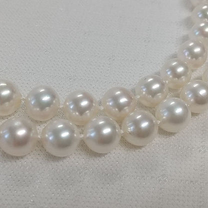 Akoya pearl long necklace with two strands of round 6.5-7 mm pearls measuring 85 cm