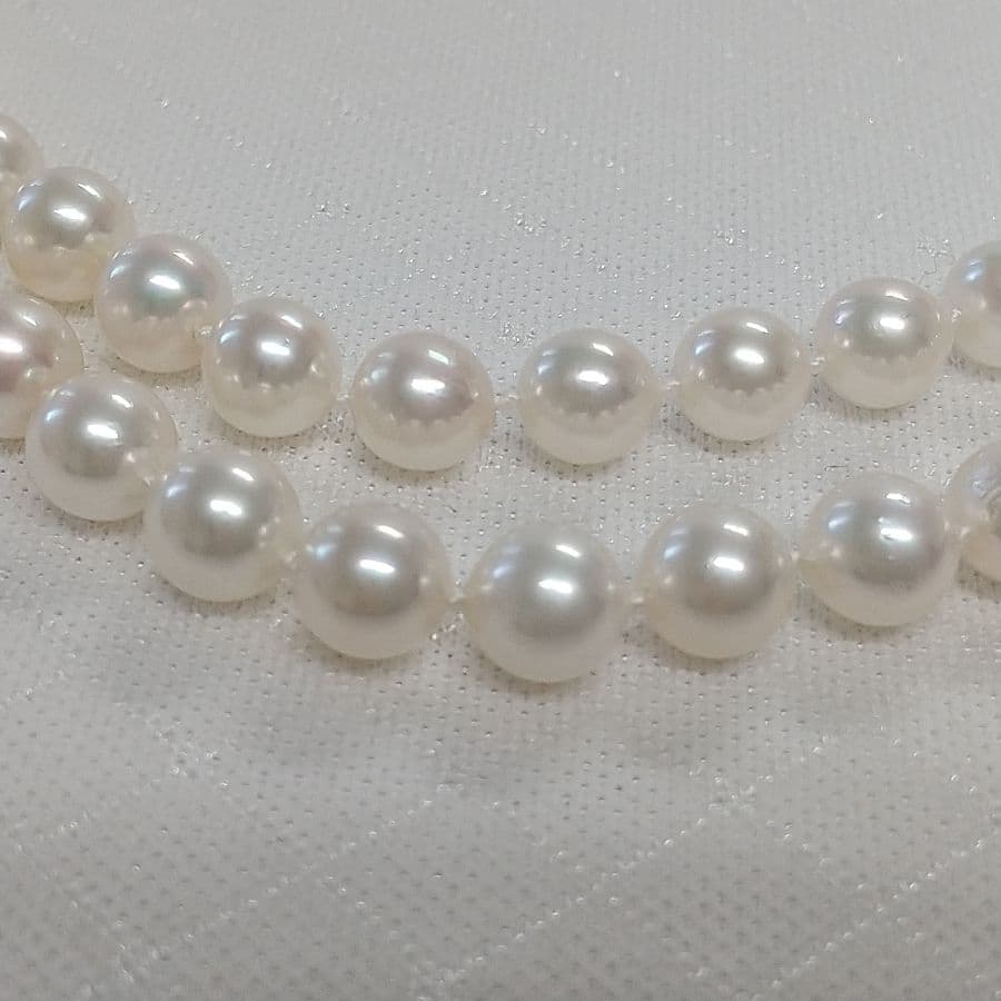 Akoya pearl long necklace with two strands of round 6.5-7 mm pearls measuring 85 cm