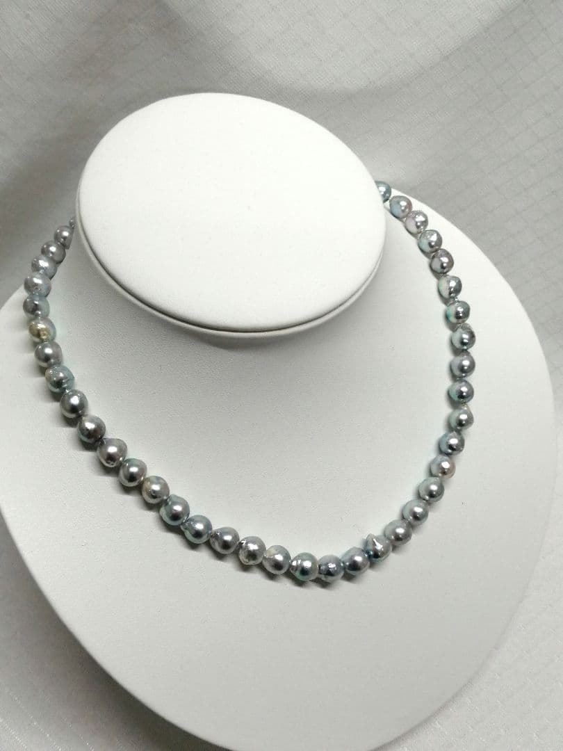 Akoya pearl necklace with natural gray 7-7.9mm pearls and 42cm length displaying a shine