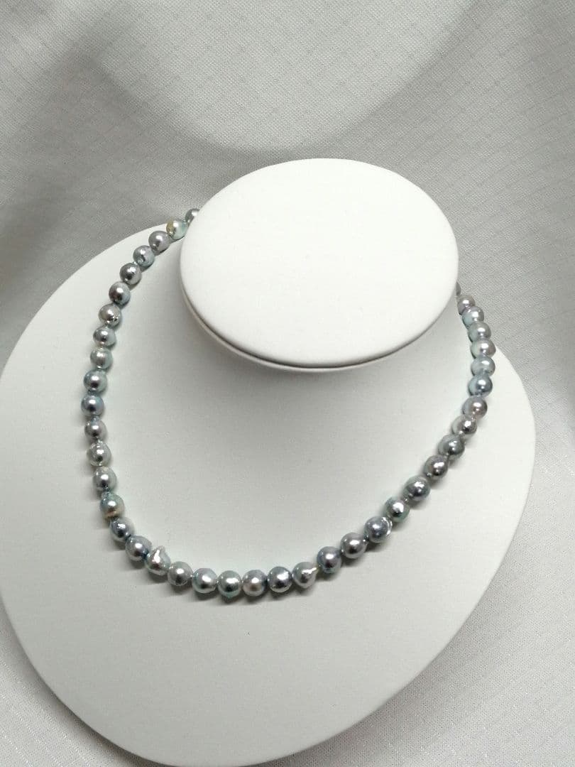 Akoya pearl necklace with natural gray 7-7.9mm pearls and 42cm length displaying a shine