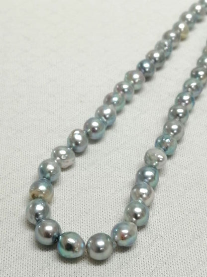Akoya pearl necklace with natural gray 7-7.9mm pearls and 42cm length displaying a shine