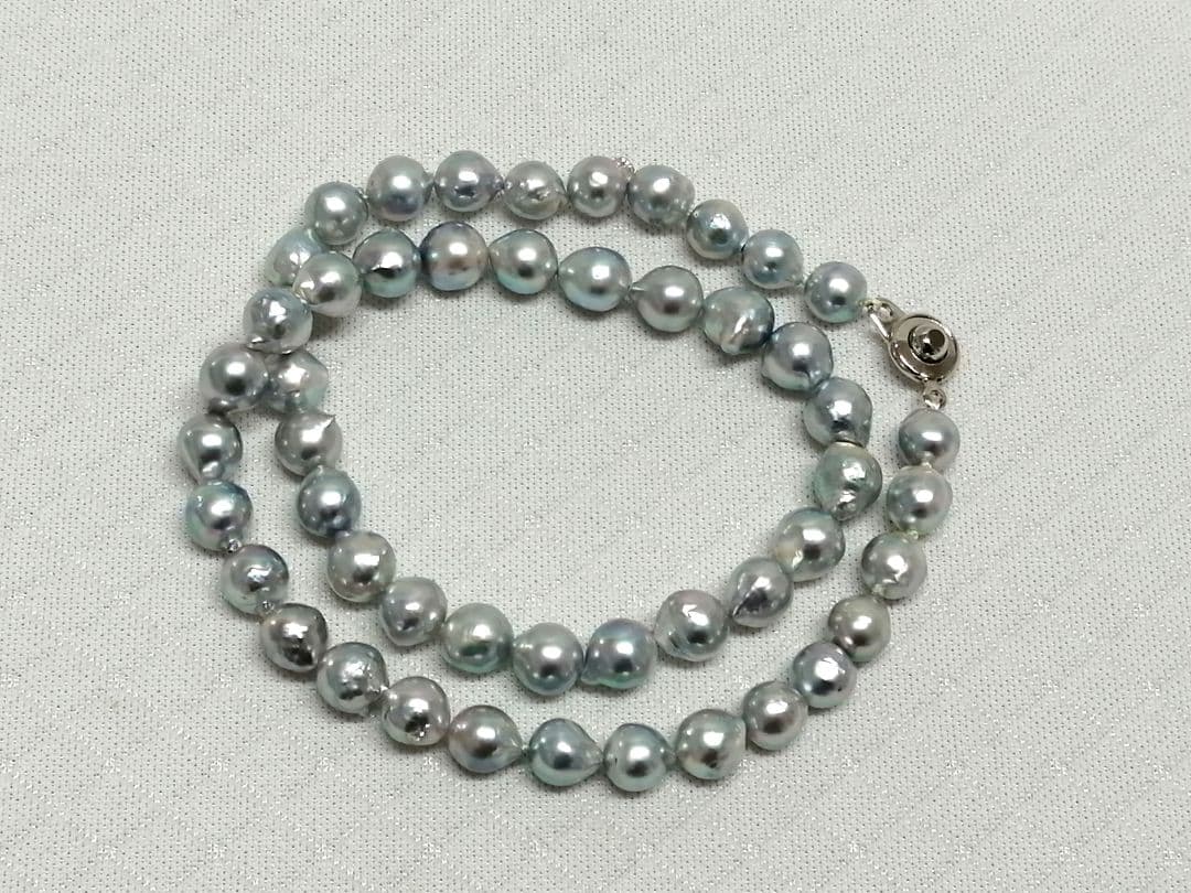Akoya pearl necklace with natural gray 7-7.9mm pearls and 42cm length displaying a shine