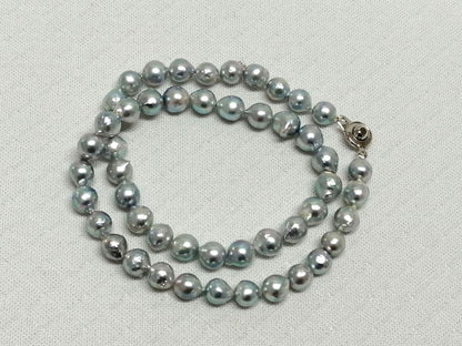 Akoya pearl necklace with natural gray 7-7.9mm pearls and 42cm length displaying a shine