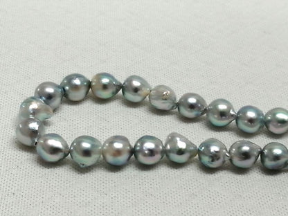 Akoya pearl necklace with natural gray 7-7.9mm pearls and 42cm length displaying a shine