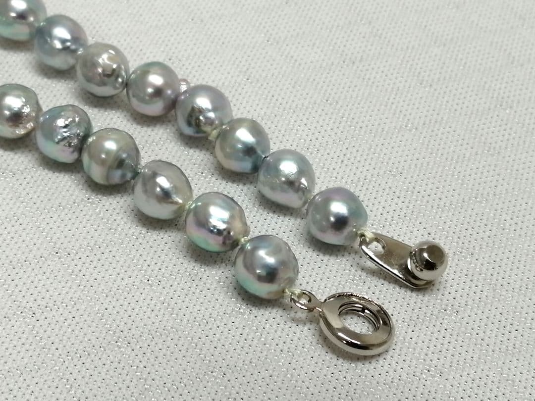 Akoya pearl necklace with natural gray 7-7.9mm pearls and 42cm length displaying a shine