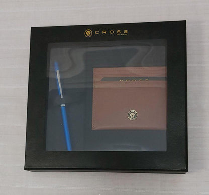 Cross ballpoint pen with blue brass resin body and chrome details alongside a brown leather card case